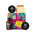 All the Best. A square box, wrapped in green, floral printed banana paper, tied with pink ribbon and a yellow gift tag.